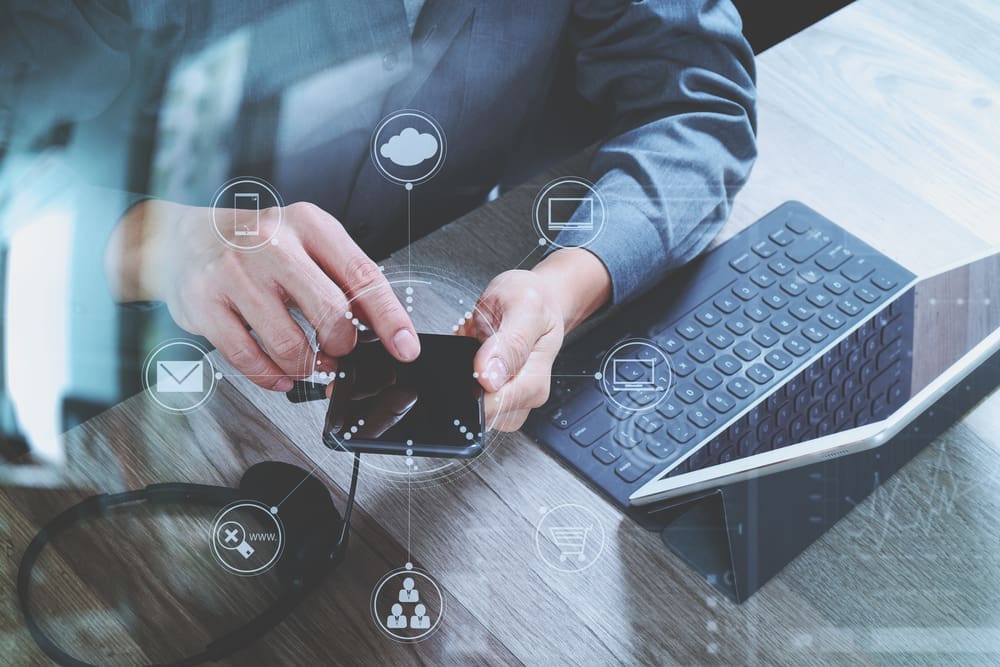 Man using VOIP headset with digital tablet